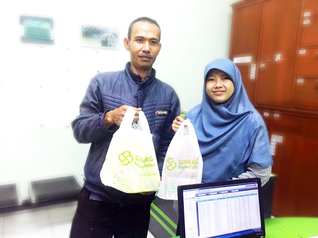 sinergi pelayanan masyarakat, spm, dhafa, bantuan beras